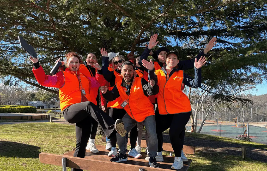 Large corporate group enjoying a nature-inspired Amazing Race team building day in the Blue Mountains