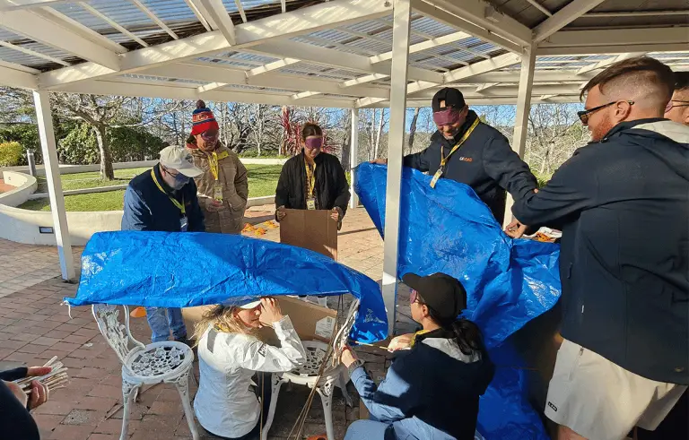 Large corporate group enjoying a nature-inspired Amazing Race team building day in the Blue Mountains
