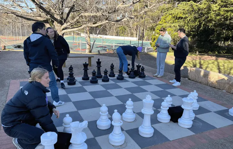 Large corporate group enjoying a nature-inspired Amazing Race team building day in the Blue Mountains
