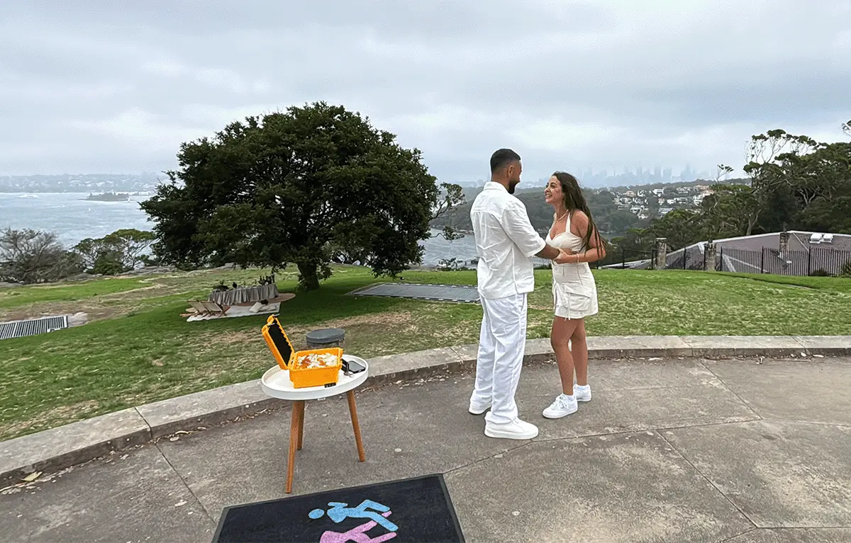 Surprise engagement during a Proposal Amazing Race overlooking Sydney Harbour