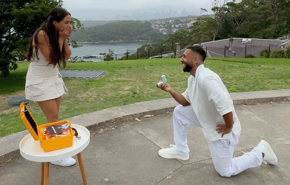 Surprise engagement during a Proposal Amazing Race overlooking Sydney Harbour