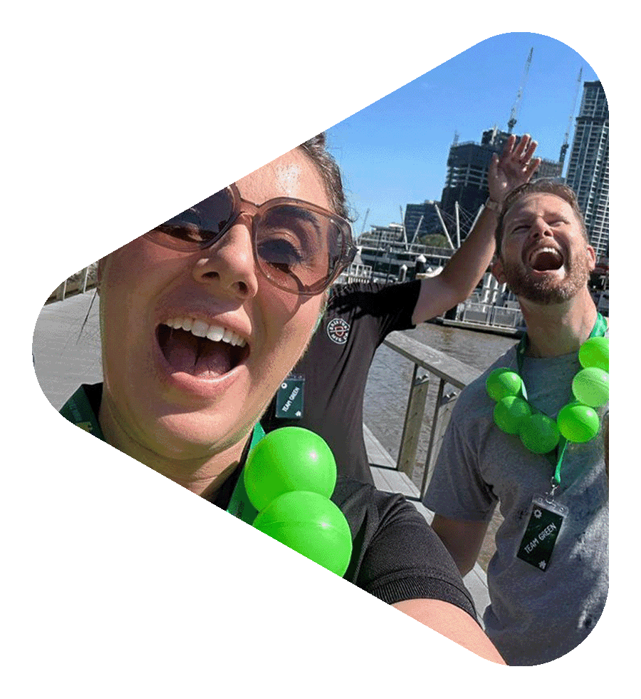 Teams enjoying a fun outdoor team building session in Brisbane