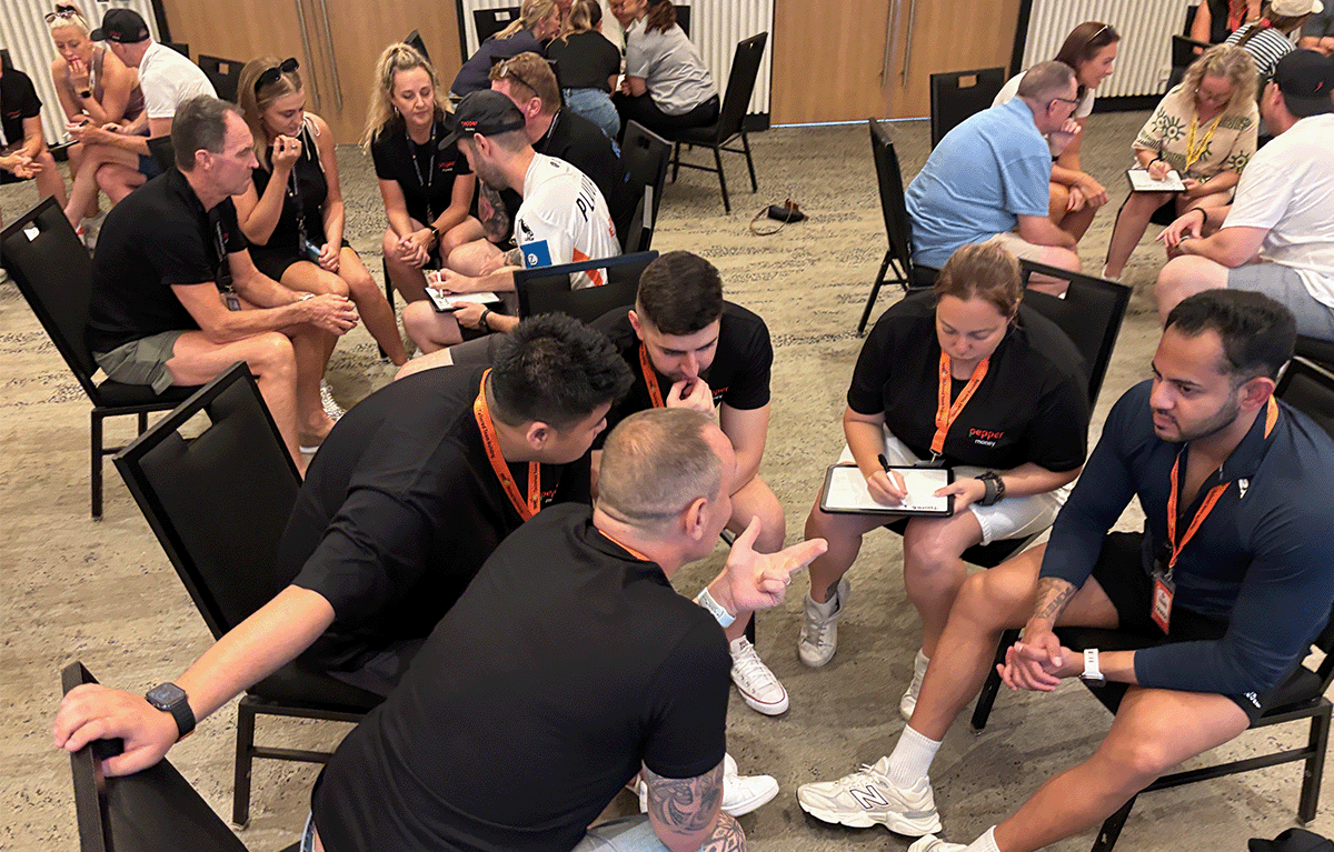 Indoor team building activity used as a wet weather backup plan during corporate event