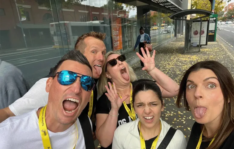 Teams working together during a fun Brisbane Amazing Race checkpoint challenge