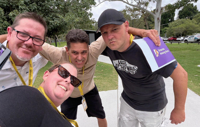 High-energy corporate Amazing Race spanning multiple cities with teams completing challenges