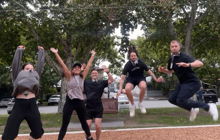 High-energy corporate Amazing Race spanning multiple cities with teams completing challenges