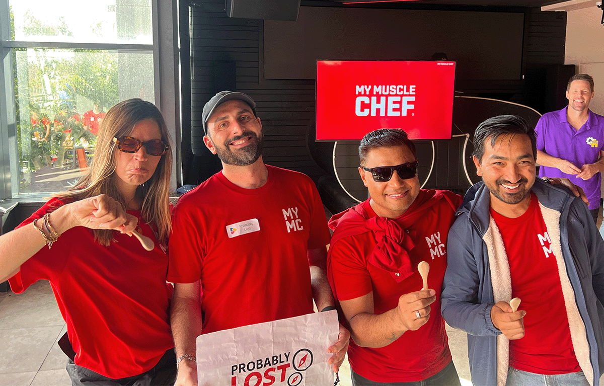 Teams completing fun team building challenges during a Sydney Corporate Amazing Race