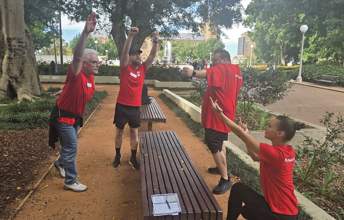 Teams completing fun team building challenges during a Sydney Corporate Amazing Race