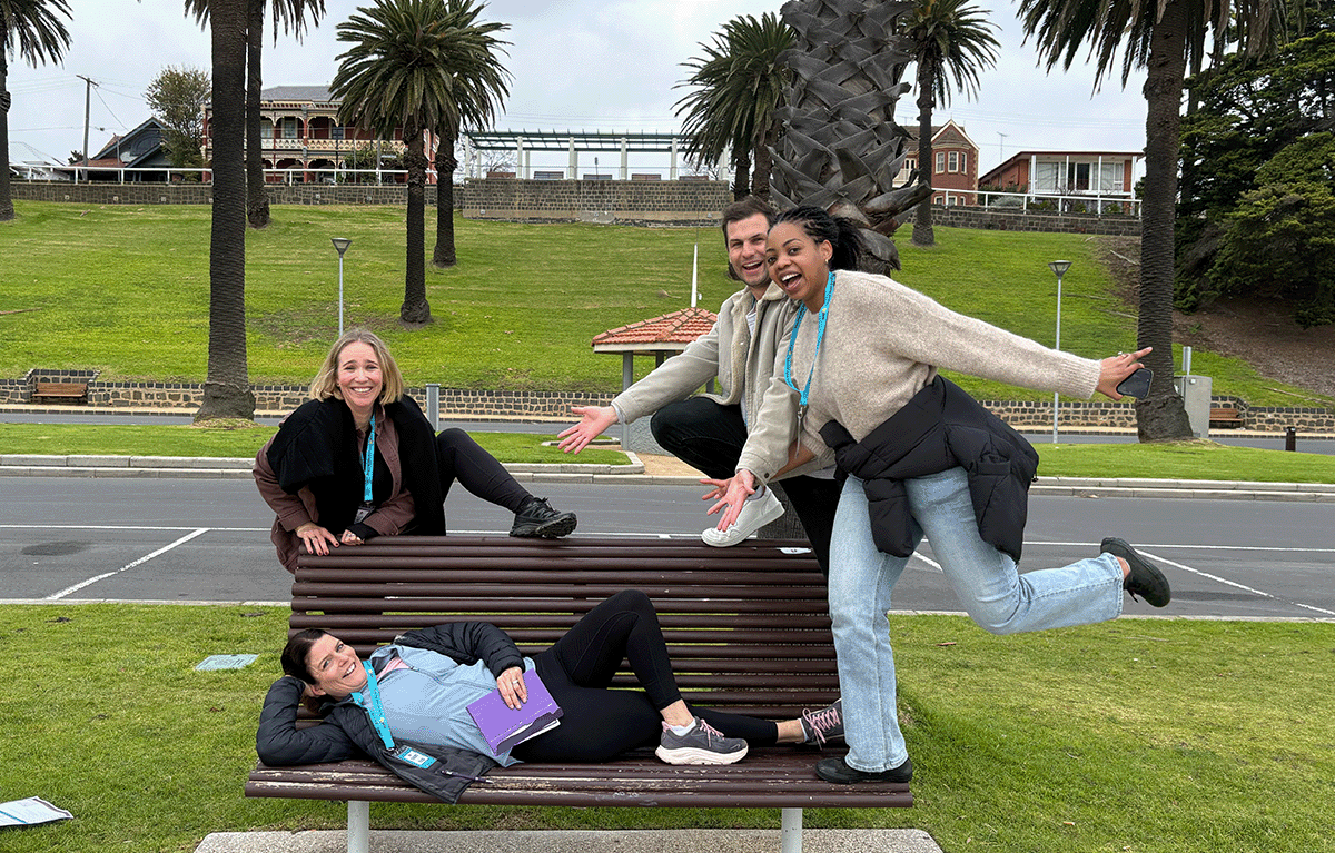 Corporate Amazing Race team completing a photo challenge on the Geelong foreshore