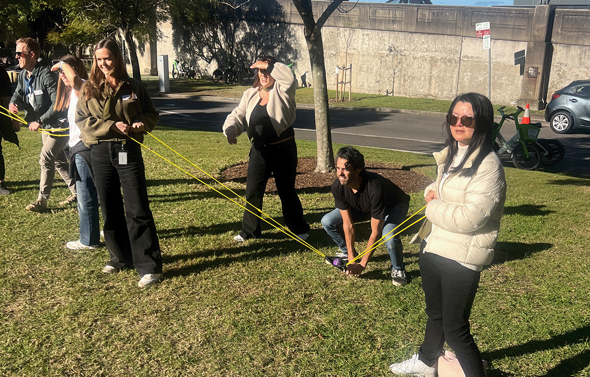 Teams competing in a Sydney Amazing Race during a corporate team building event in the CBD