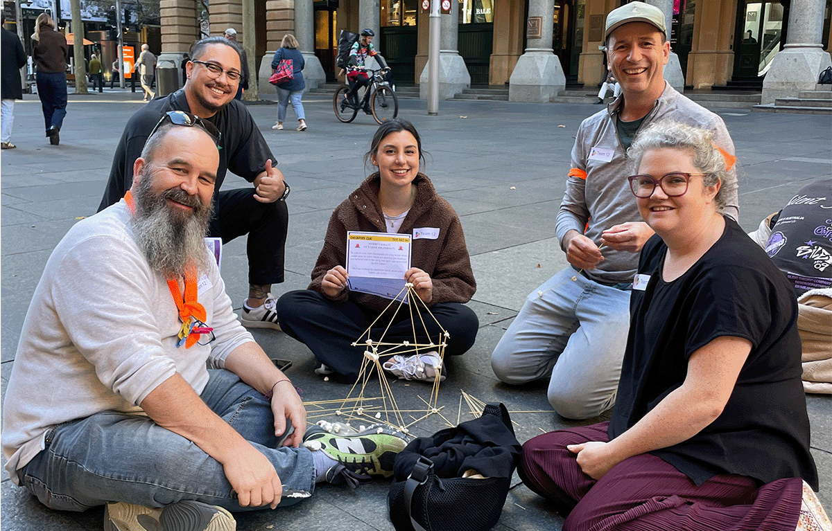 Teams competing in a Sydney Amazing Race during a corporate team building event in the CBD