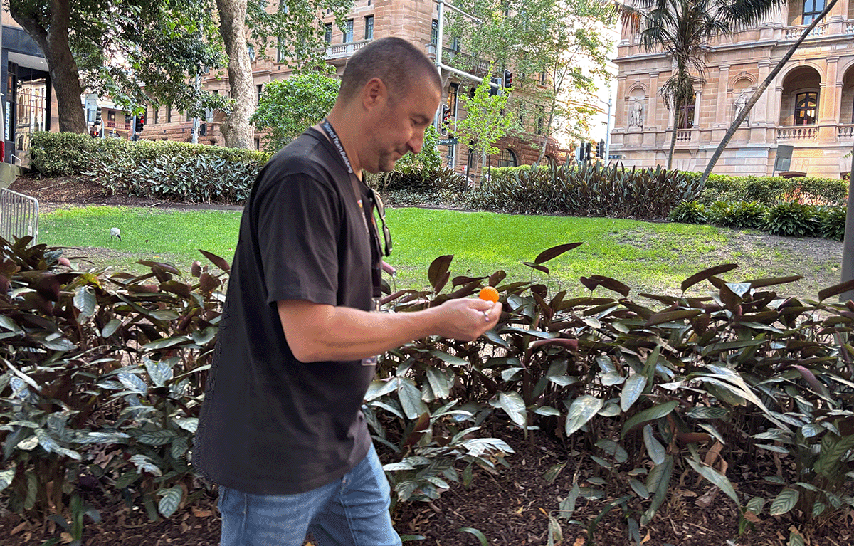 Teams completing interactive challenges during a Multi-City Corporate Amazing Race