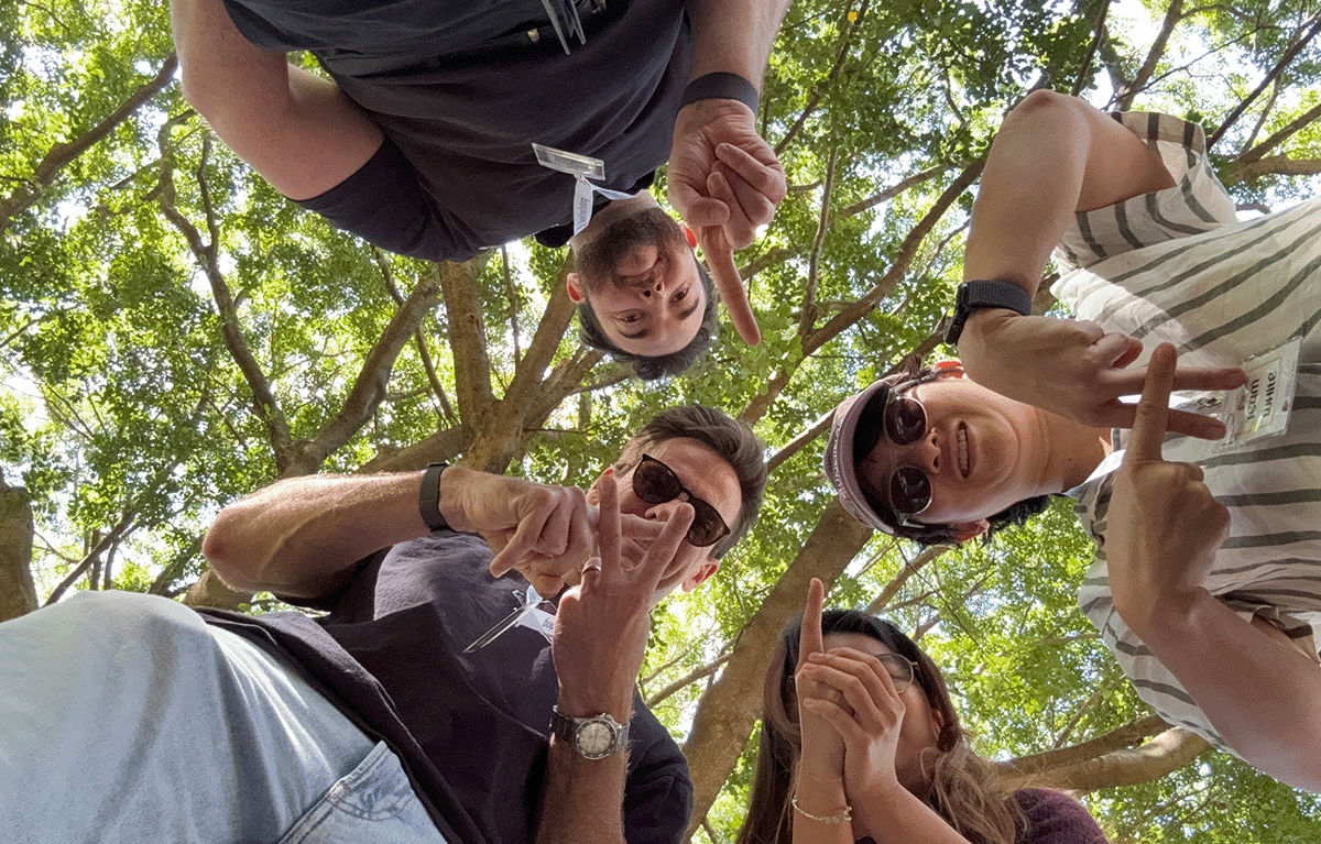 Teams completing interactive challenges during a Multi-City Corporate Amazing Race