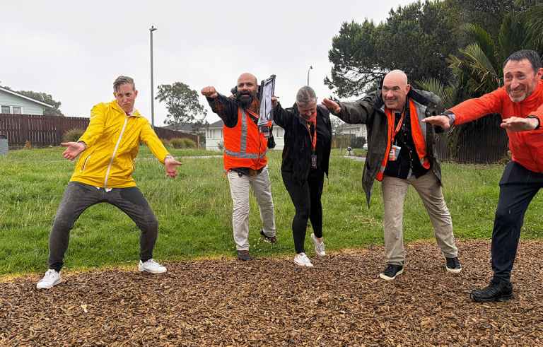Teams having fun during a rainy outdoor amazing race