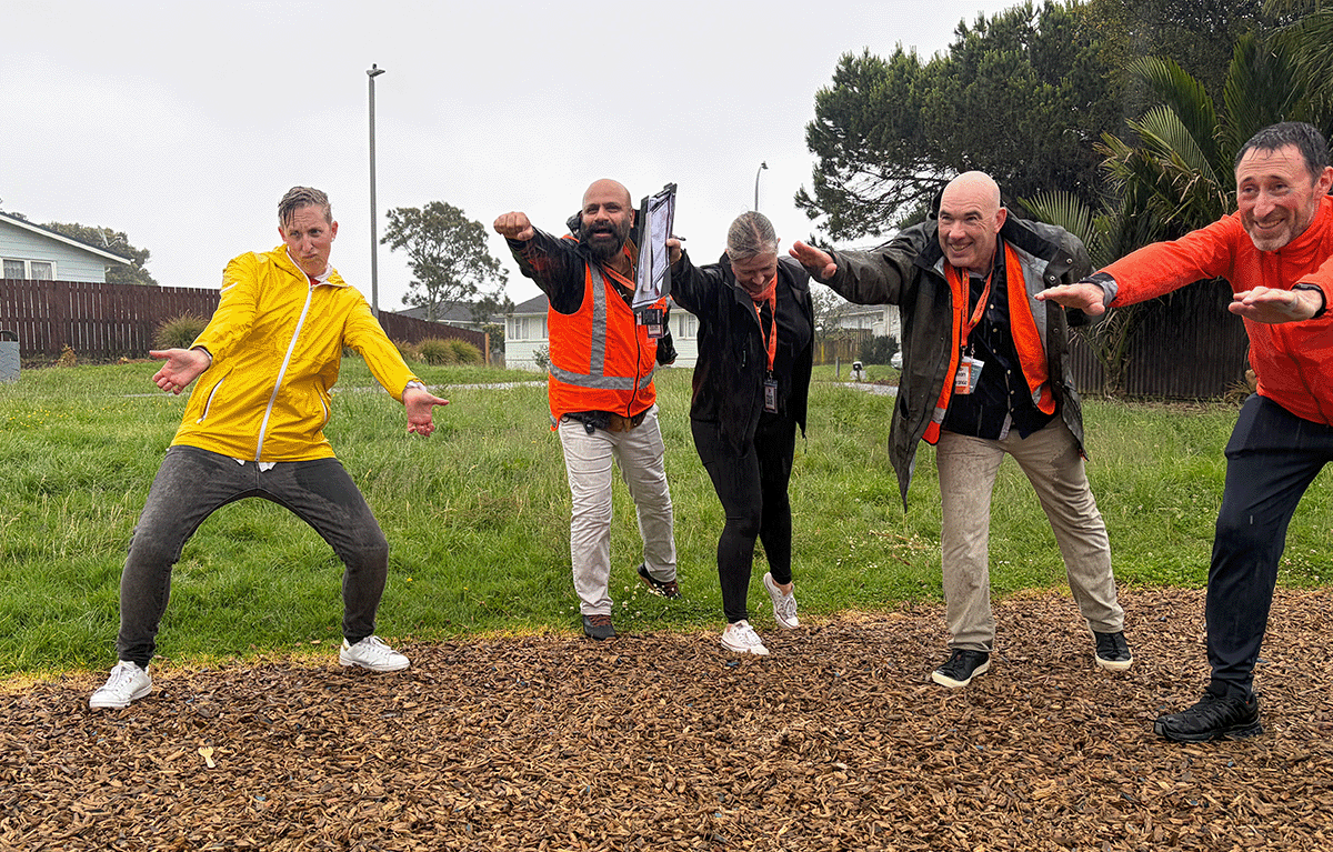 Teams having fun during a rainy outdoor amazing race