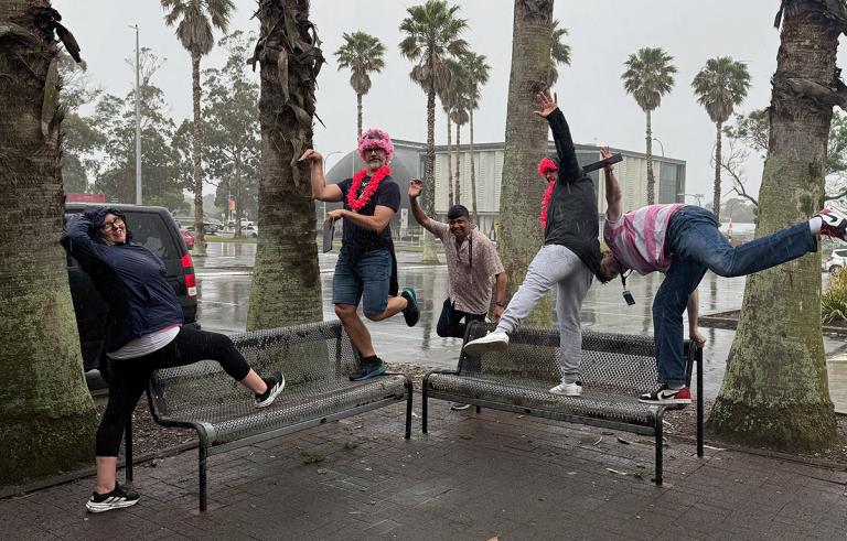 Teams having fun during a rainy outdoor amazing race