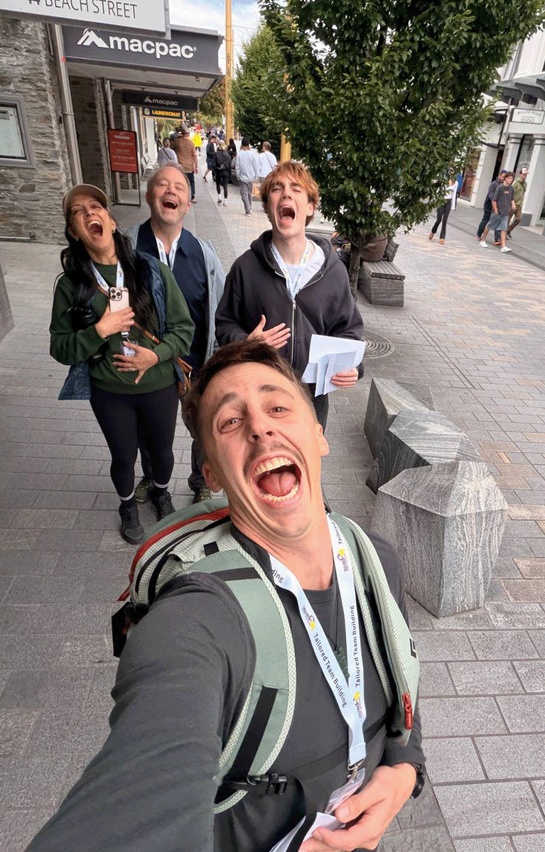 Teams laughing during a Corporate Amazing Race