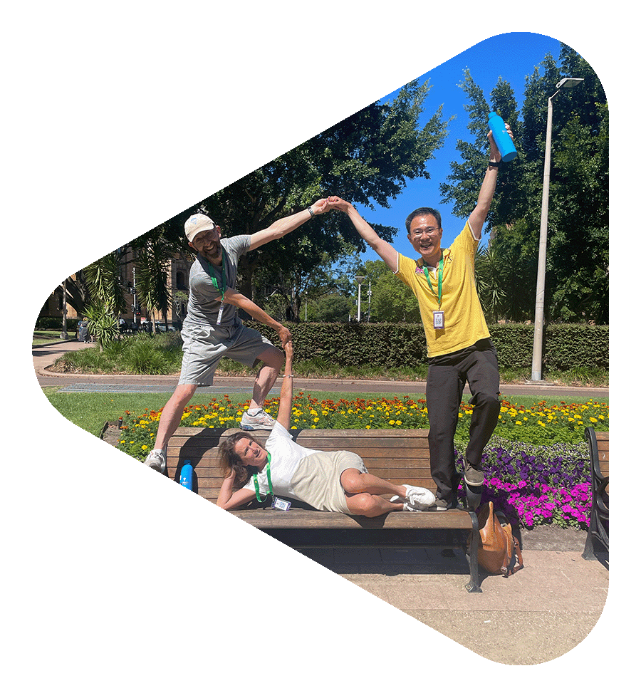 Teams enjoying a fun outdoor team building event with Tailored Team Building