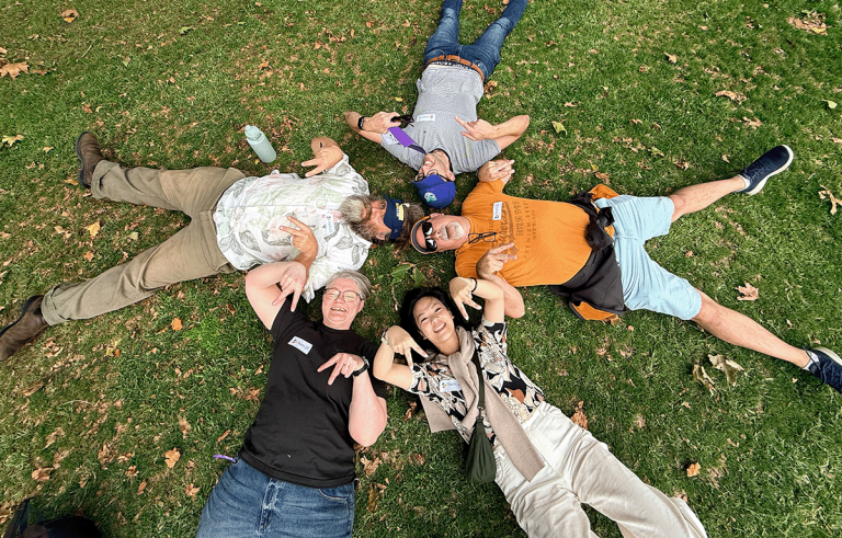 Team building Dunedin group collaborating during a clue challenge