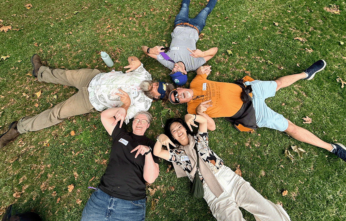 Teams running between checkpoints in Auckland Amazing Race team building event