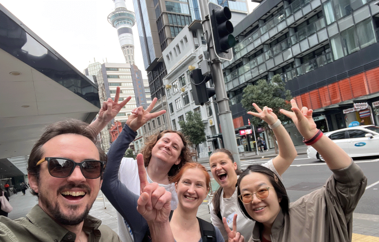 Teams running between checkpoints in Auckland Amazing Race team building event