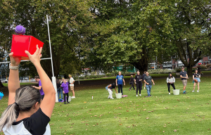 Team completing slingshot challenge during Auckland corporate Amazing Race