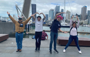 Corporate Amazing Race teams racing through Auckland CBD during team building event