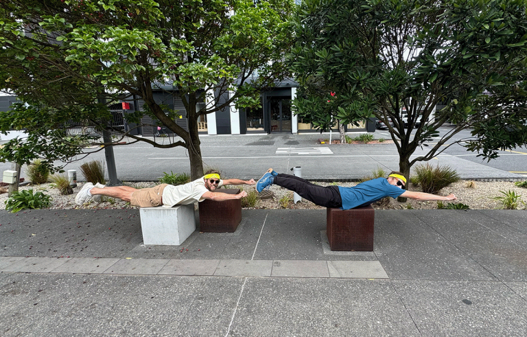 Teams running between checkpoints in Auckland Amazing Race team building event