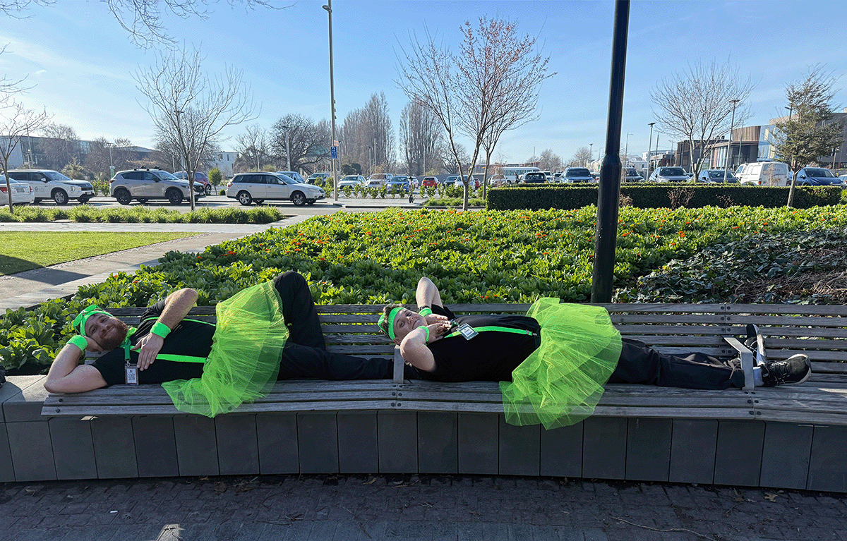 Rave Build teams in colourful outfits during a Christchurch Amazing Race team building event.
